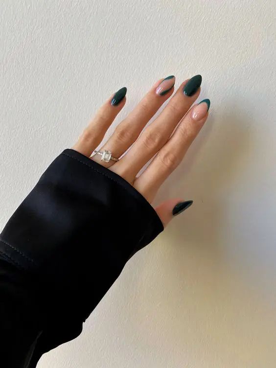 Chic Almond-Shaped Gel Nails in Dark Green and Nude with Negative Space Accents