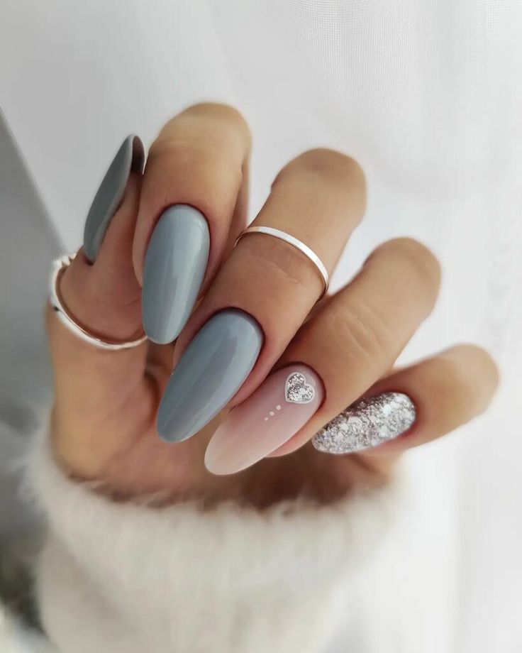 Sophisticated Nail Design with Muted Gray, Soft Nude, and Sparkling Silver Accents.