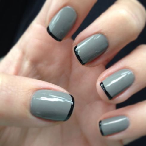 Modern Sophistication: Chic Gray Nails with Sleek Black Tips.