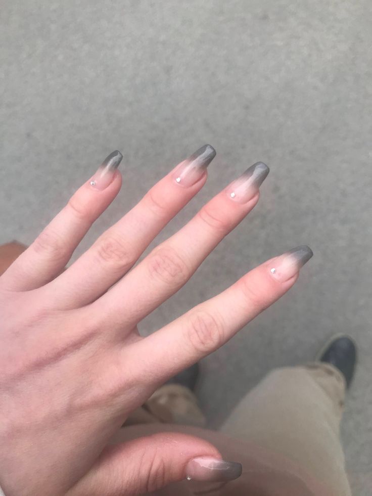 Chic Ombre Nail Design: Nude to Deep Gray Gradient with Rhinestone Accents