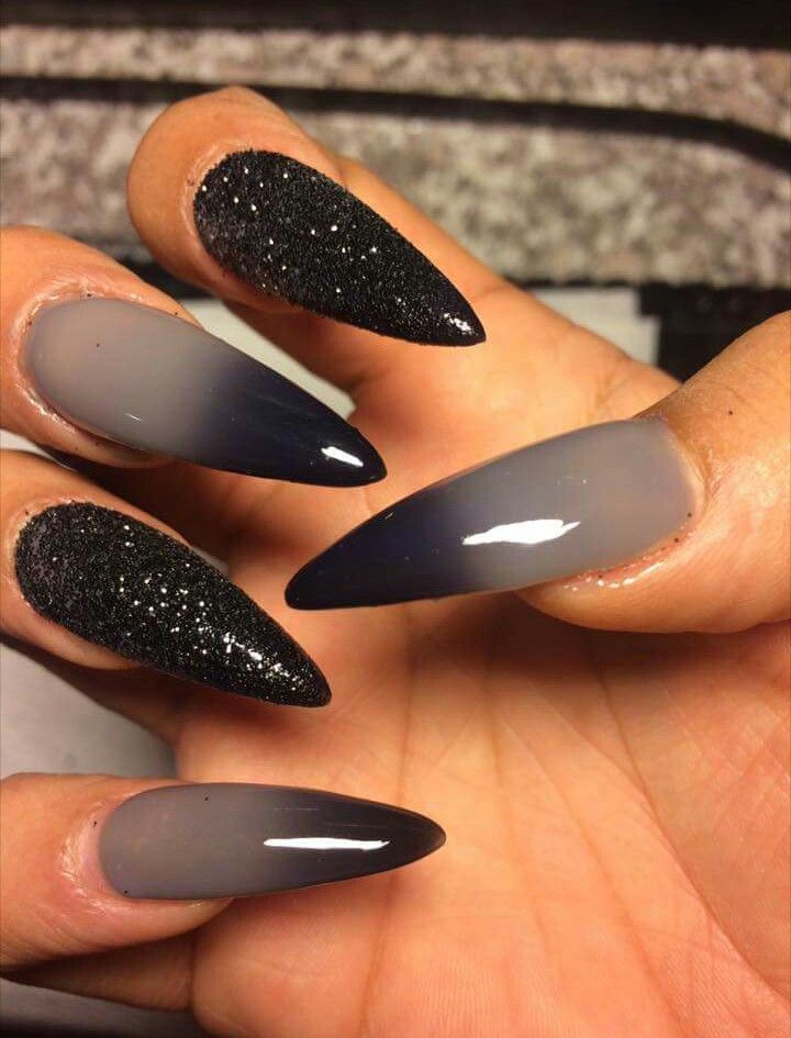 Sophisticated Ombre Stiletto Nails: Light to Dark Gray Gradient with Glossy Black Glitter