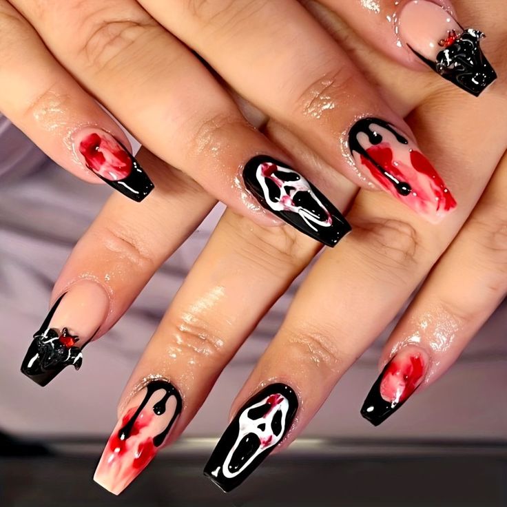 Dramatic Gothic Nail Design with Black and Red Hues for a Bold Halloween Aesthetic