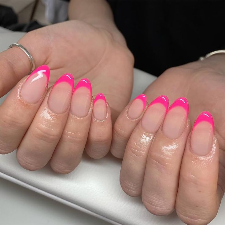 Chic Vibrant Pink French Tips: A Playful Twist on Classic Manicure.