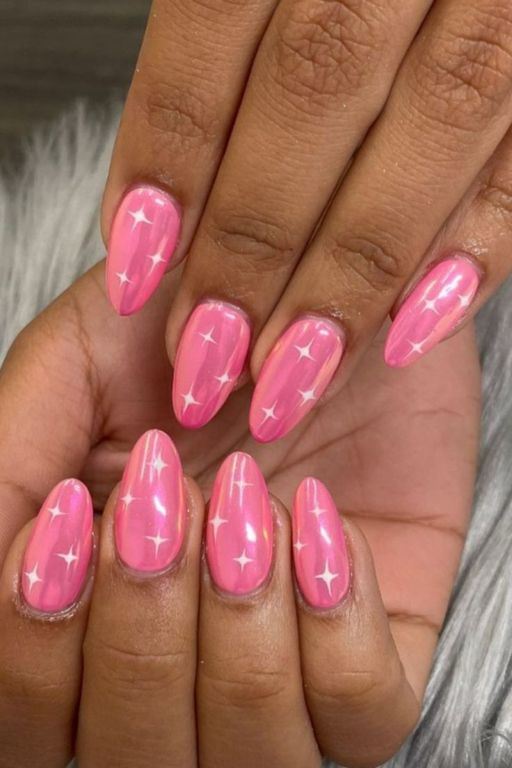 Elegant Pink Nail Design with Playful White Star Accents