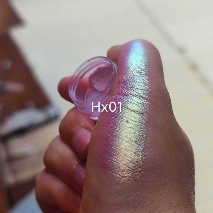 Holographic Iridescent Nail Shimmer: Mesmerizing Color Shifts for Glamorous Occasions.