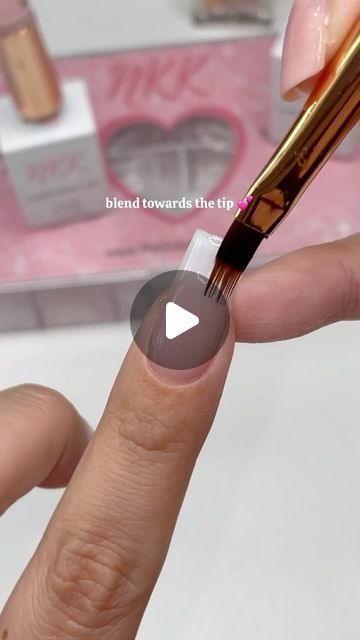 Precision Nail Application Technique Showcasing Artistry and Smooth Transitions.