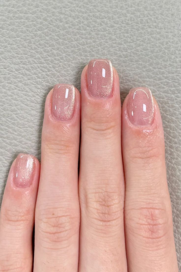 Elegant Soft Nude Nail Design with Sheer Gloss and Subtle Shimmer