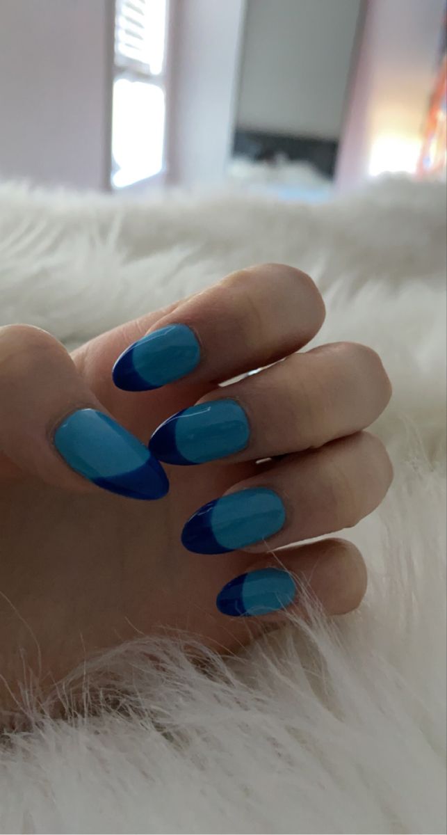 Chic Gradient Blue Nail Design: Stylish Contrast for a Modern French Manicure.