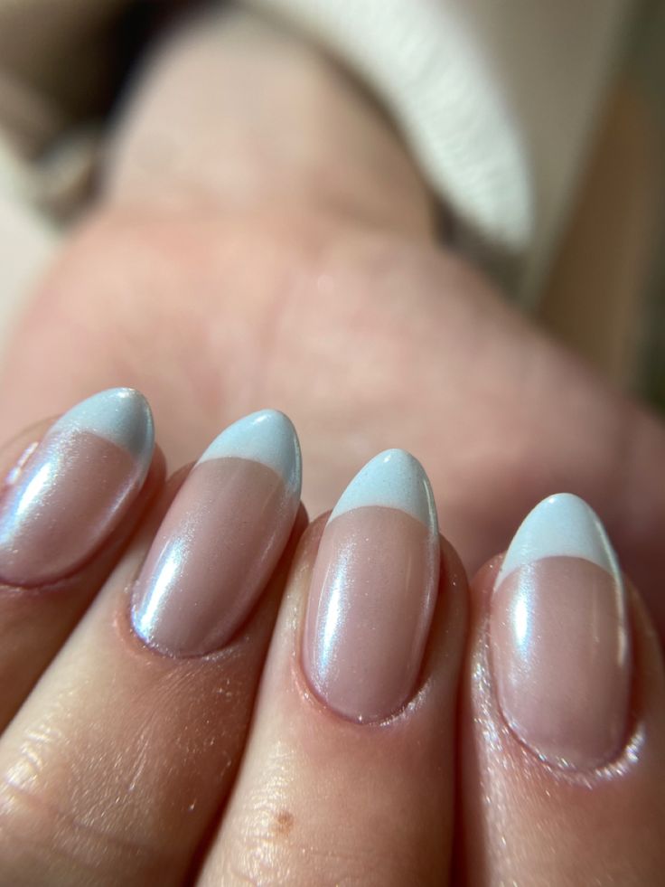 Chic Nude Base with Delicate Blue Tips: A Modern Twist on French Manicure