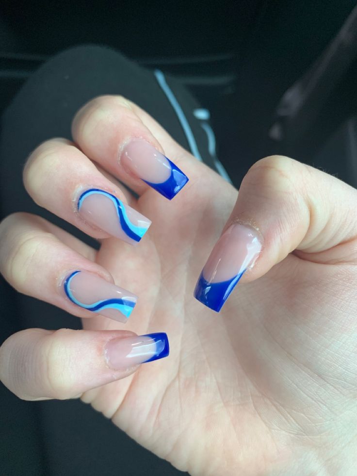 Elegant Blue Ombre Nail Design with Clear Enhancements.