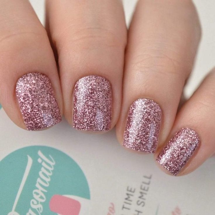 Dazzling Rose Gold Glitter Nail Design for Glamorous Occasions.