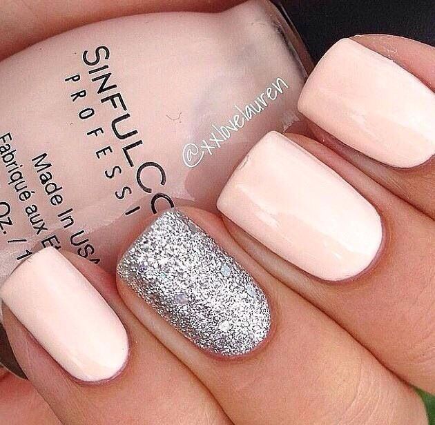 Chic Pastel Pink Nail Design with Striking Glitter Accent