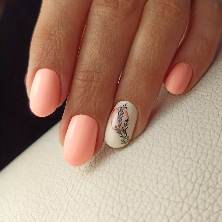 Chic Peach Nails with Minimalist Floral Accent for a Fresh Look.