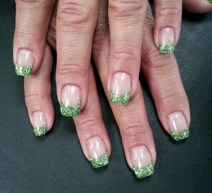 Vibrant Glittery Green French Tips: A Playful and Elegant Nail Design for Spring and Summer.