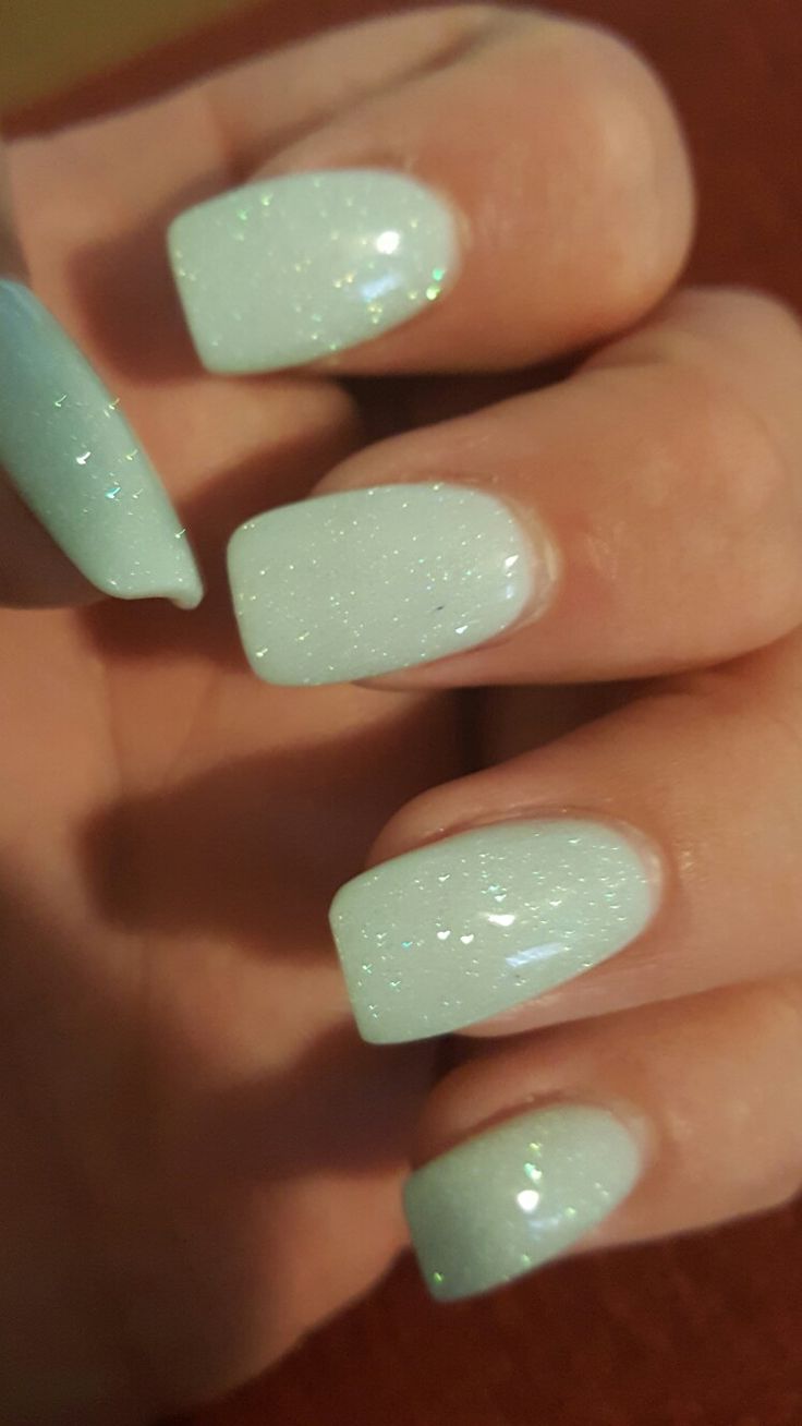 Whimsical Mint-Green Gradient Nails with Shimmer: Perfect for Any Occasion.