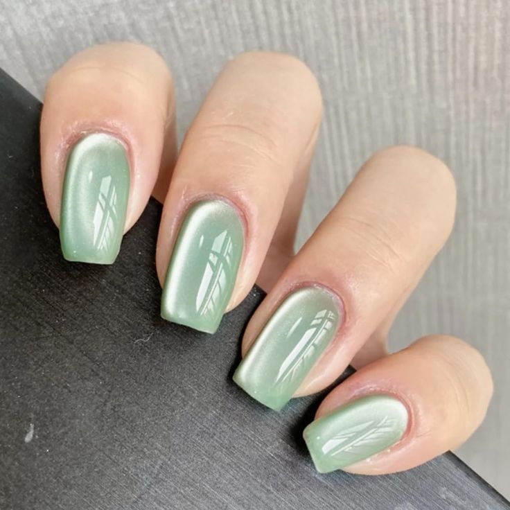 Elegant Gradient Soft Green Nail Design with Glossy Finish and Minimalist Aesthetic.