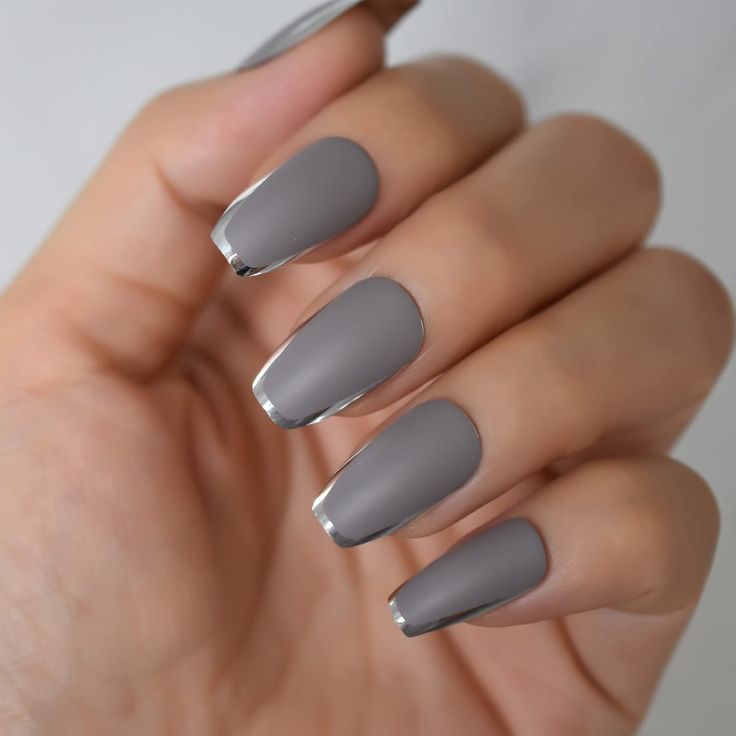 Sleek Matte Gray Nails with Glossy Silver Tips: A Versatile and Elegant Design.