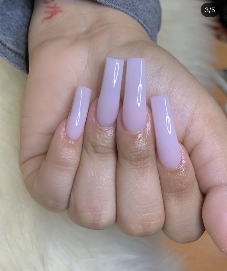 Chic Soft Pink Matte Finish Long Nails: A Modern Minimalist Look.