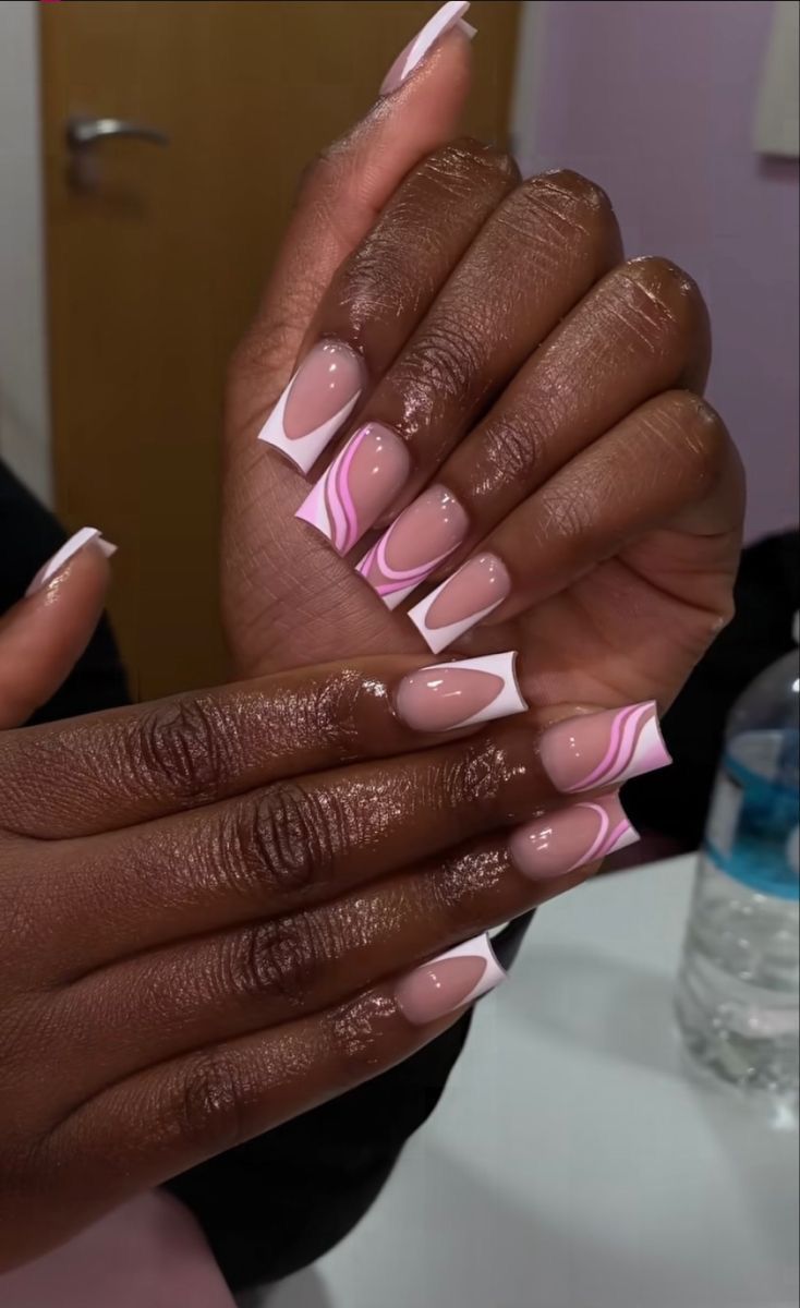 Elegant Soft Pink and White Swirl Nail Design with Glossy Finish