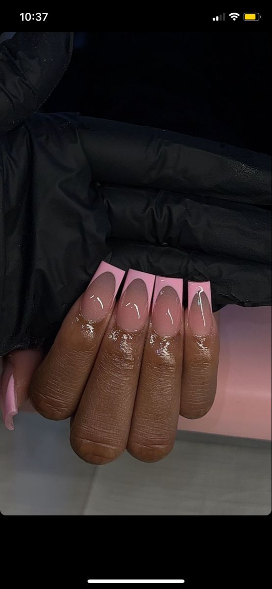 Sophisticated Ombre Nail Design: Soft Pink to Darker Tips with Modern Squared Shape.