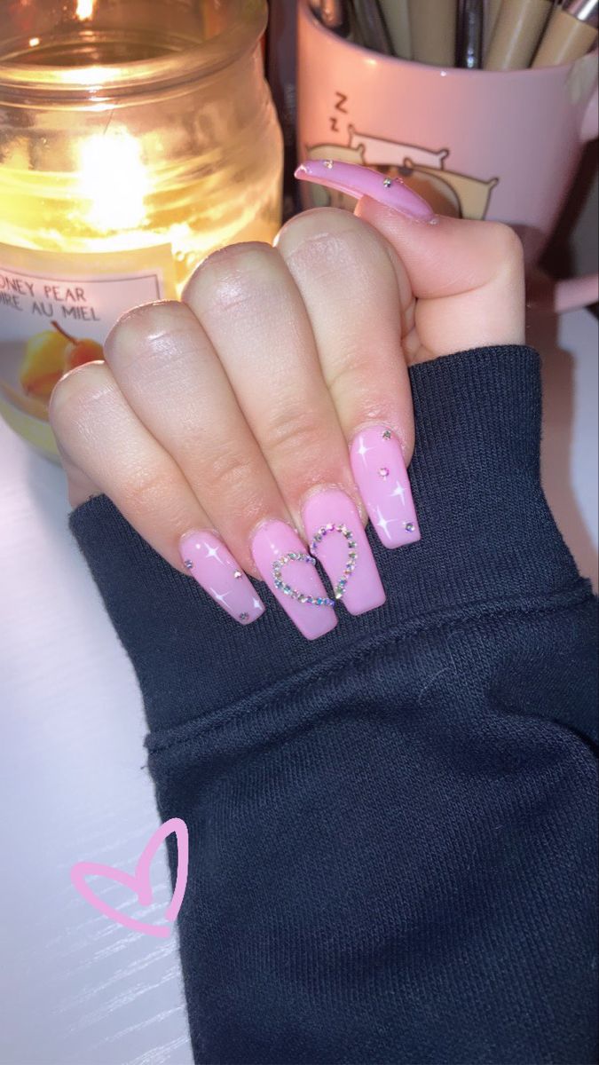 Romantic Chic Pink Nail Design with Rhinestones and Heart Shapes