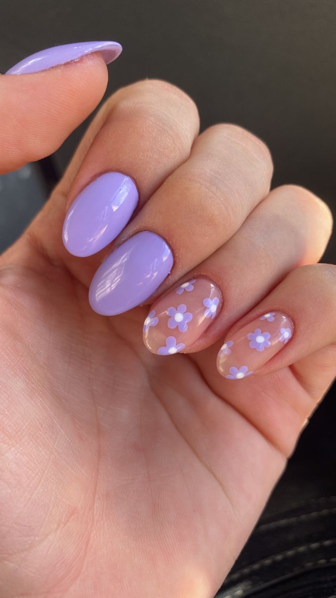 Elegant Lavender Nail Design with Floral Accents for a Cheerful Touch