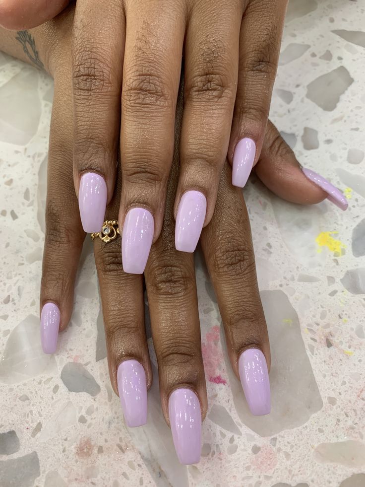 Sophisticated Lavender Coffin Nails with Glamorous Gold Accent