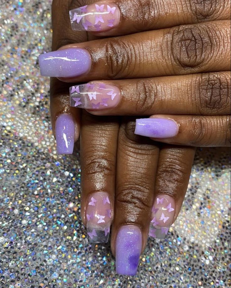 Dreamy Lavender and Purple Gradient Nail Art with Intricate Butterfly Accents