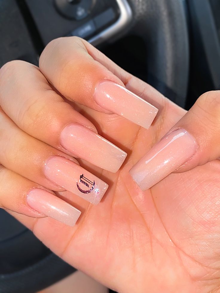 Sophisticated Elegant Nude Nails with Glossy Finish and Subtle Gradient