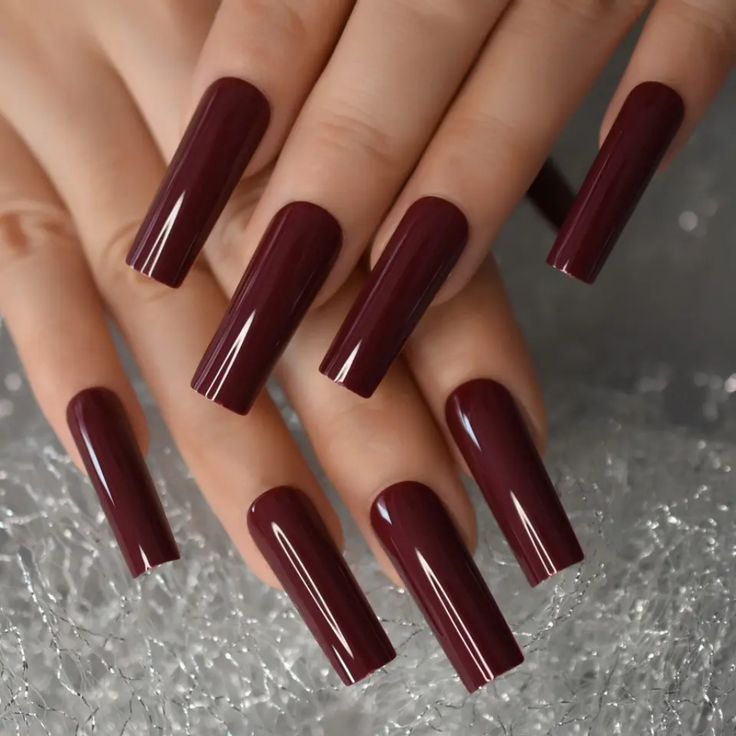 Sophisticated Dark Burgundy Nails with Glossy Finish for Bold Elegance.