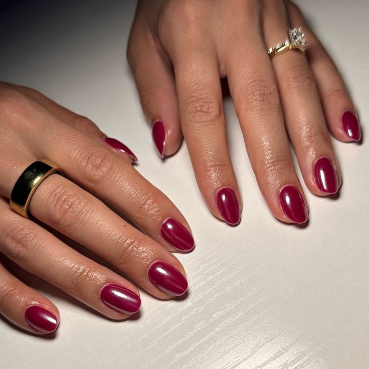 Chic Burgundy Nail Design with Elegant Oval Shapes and Glossy Finish