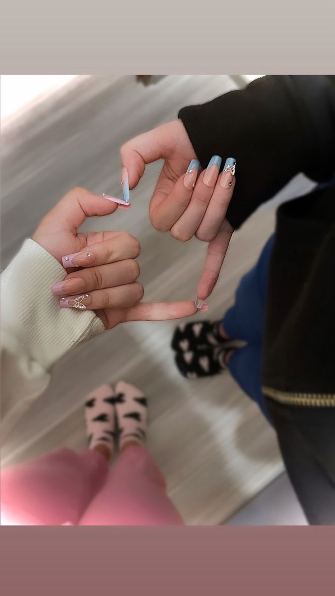 Creative and Elegant Nail Designs: Blending Soft Pink Florals with Chic Pastel Blue Tips