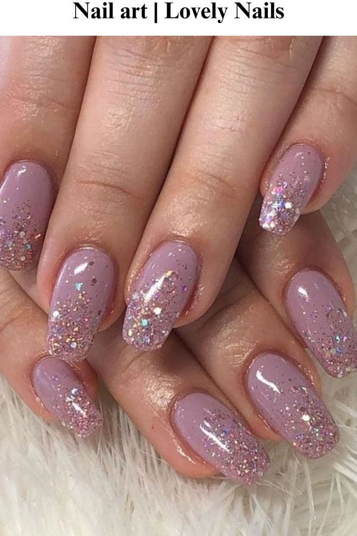 Elegant Glittery Ombre Nails with Soft Lavender Base and Iridescent Tips.