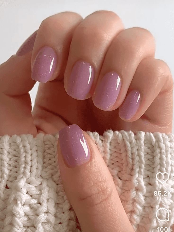 Elegant Soft Lavender Manicure with Subtle Shimmer and Glossy Finish