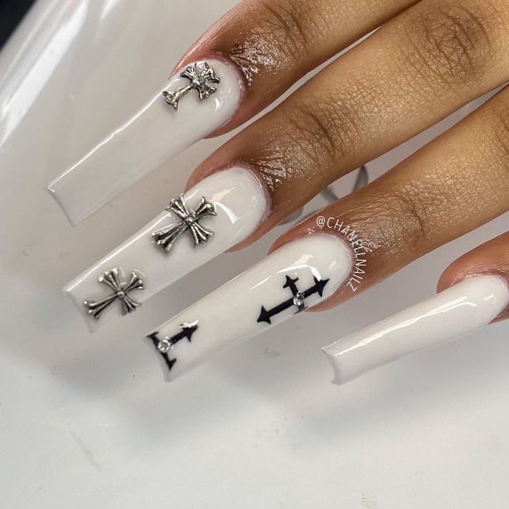 Chic and Edgy Matte White Nails with Metallic Embellishments and Cross Designs