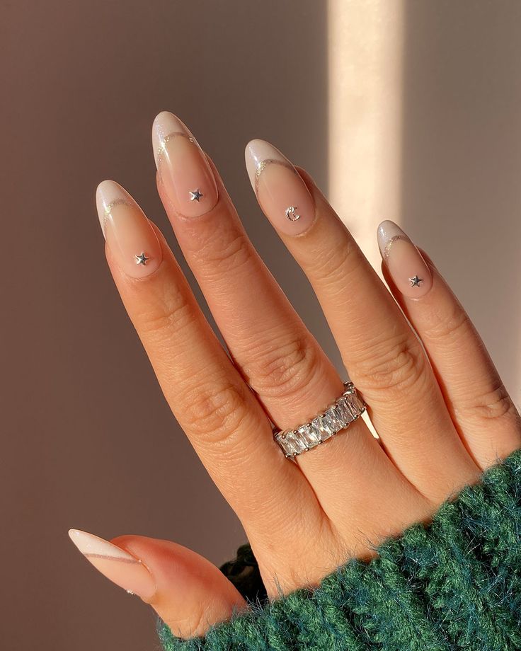 Sophisticated French Tip Ombre Nails with Sparkling Silver Stars