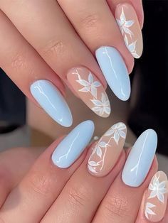 Elegant Floral Nail Design in Soft Blue and White for Spring/Summer.