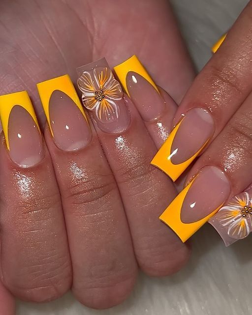 Playful and Elegant Nail Design with Bold Yellow Accents and Intricate Floral Embellishments.