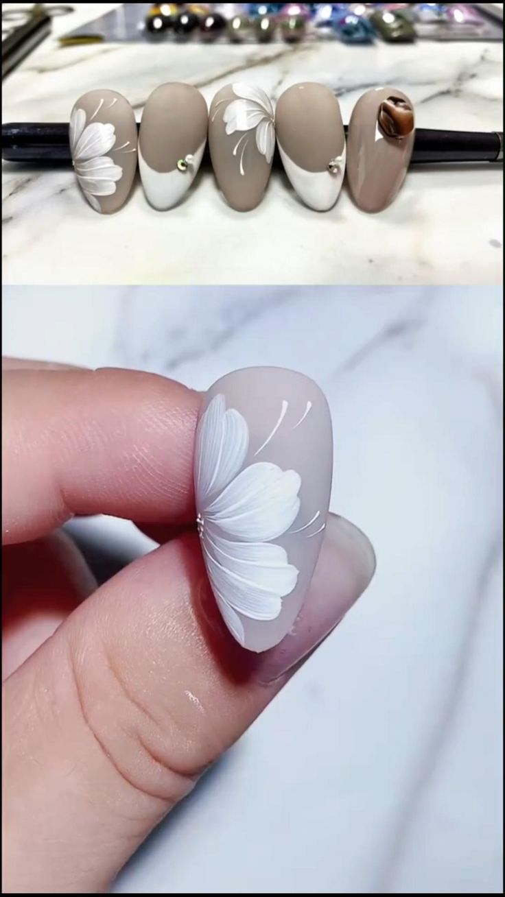 Chic Floral Nail Art: Elegant Designs on Neutral Bases.