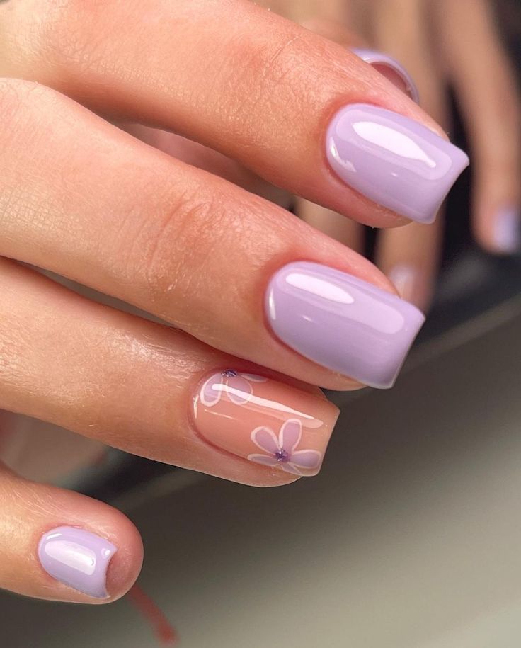 Elegant Pastel Purple Nails with Floral Design for a Fresh Spring Look