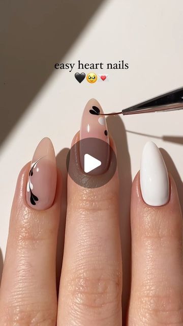 Playful Whimsical Heart Nail Design: Nude and White with Charming Black Motifs