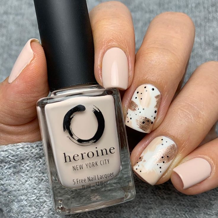 Elegant Nude Nail Design with Abstract Patterns and Earthy Tones.