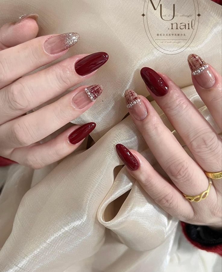 Chic Dual-Style Nail Design with Deep Red and Soft Nude Shades Enhanced by Sparkling Accents.