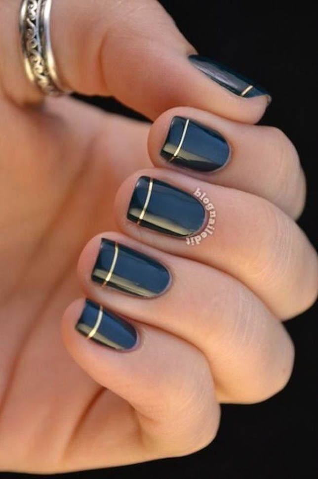 Chic Deep Navy and Metallic Gold Striped Nail Design for Any Occasion