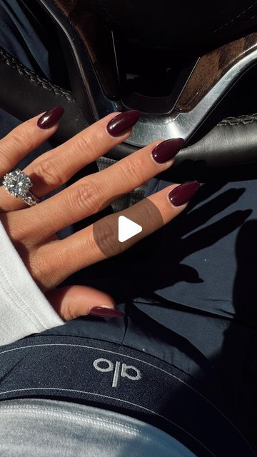 Sophisticated Elegance: Burgundy Pointed Tip Nail Design for All Occasions.