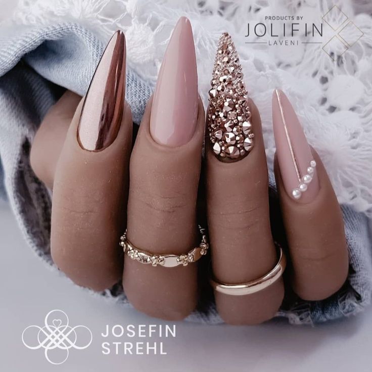 Sophisticated Nail Art: A Harmonious Blend of Glossy and Matte Finishes with Glamorous Crystal Accents and Elegant Embellishments.