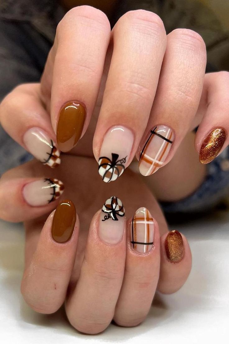 Autumn-Inspired Nail Design: A Chic Blend of Warm Colors, Creative Patterns, and Sparkling Accents