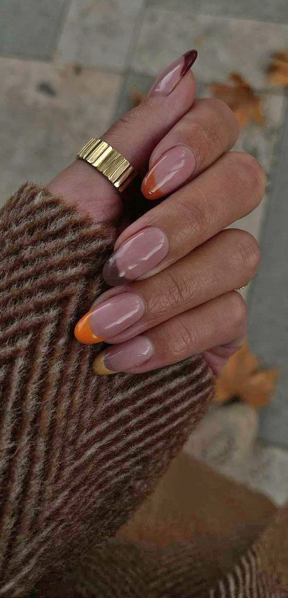 Chic Autumn Nail Design: Nude, Orange, and Deep Red Gradient with Almond Tips.