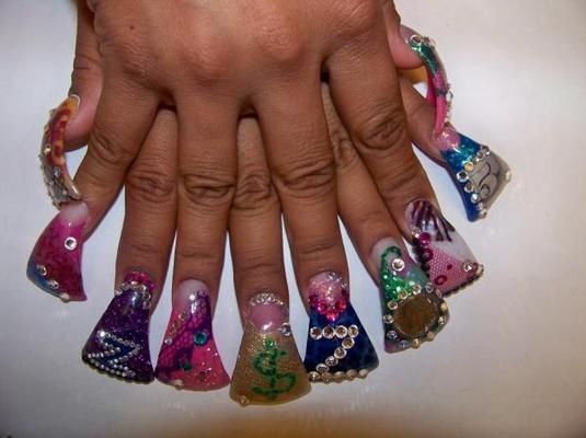 Bold and Playful Multidimensional Glitter Nail Design.