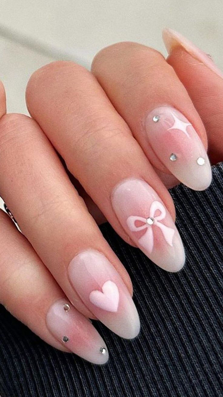 Romantic Delicate Nail Design with Soft Pink Tones and Glamorous Accents